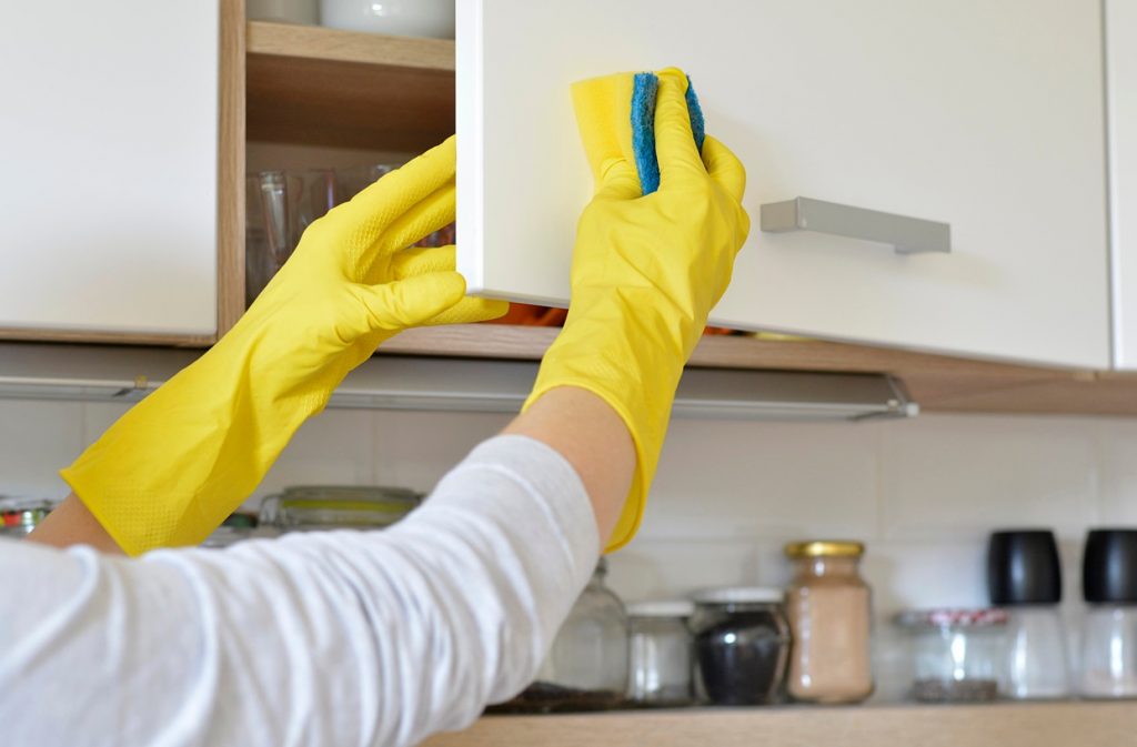 clean kitchen surfaces and appliances hygiene guide UK