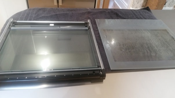 Neff oven door removed safely for cleaning glass panels