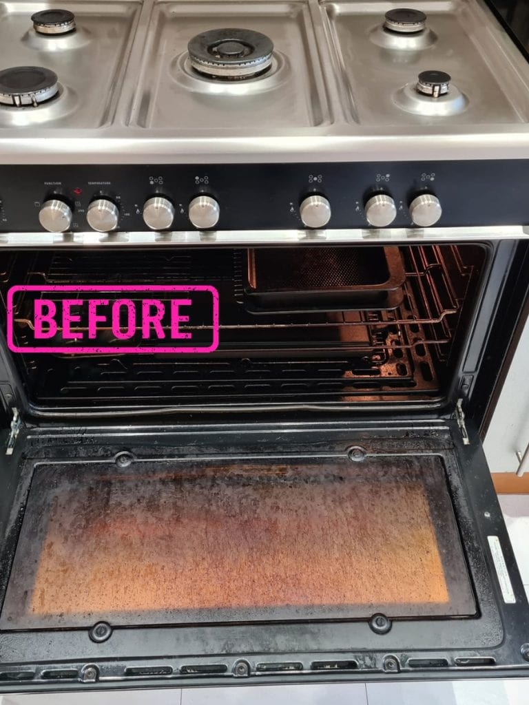 Before range cooker cleaning in Redditch showing the oven door, shelf and tray inside the oven