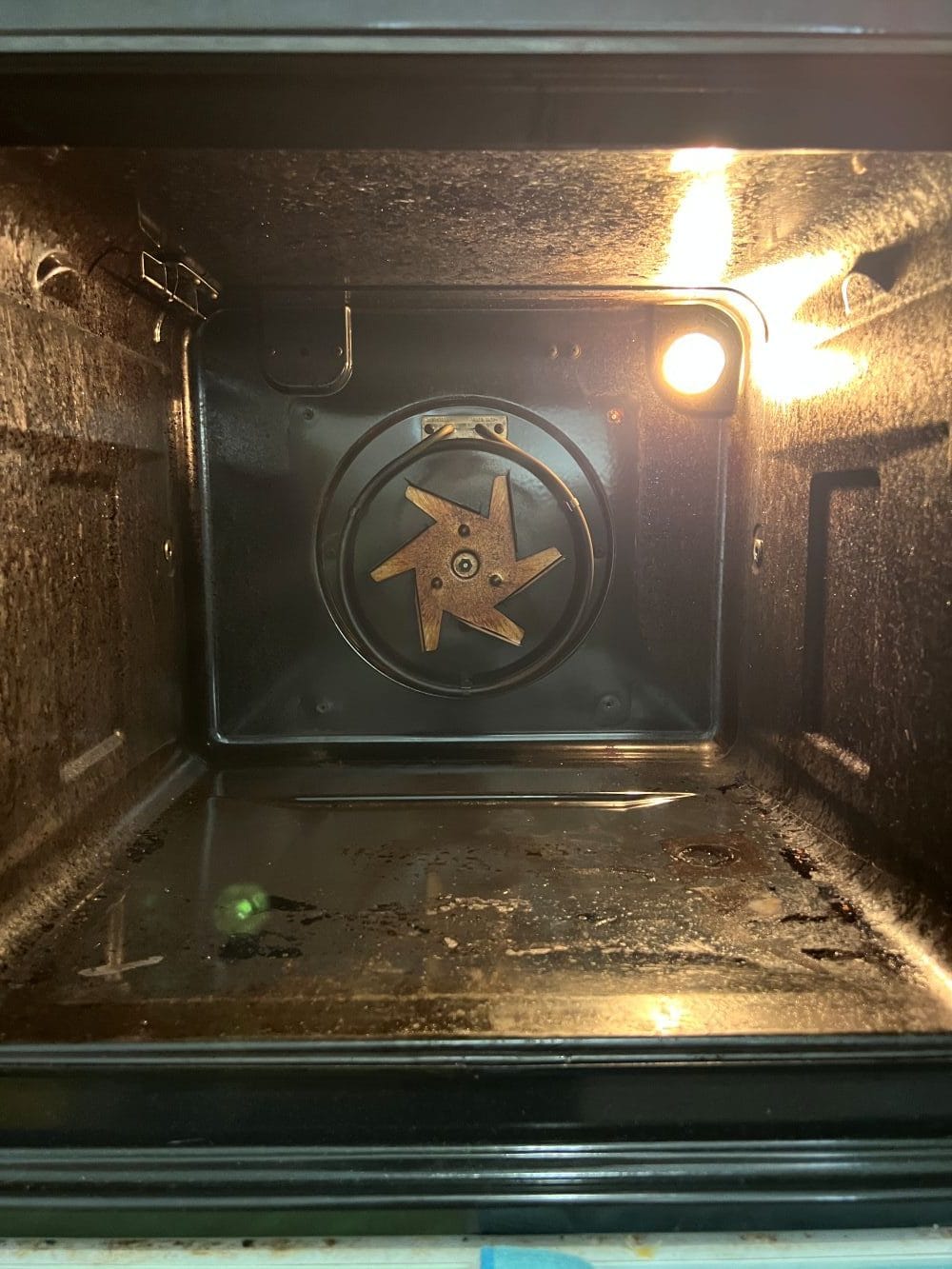 Oven Cleaning Wolverhampton 6 Dismantled oven before cleaning in Wolverhampton with racks backplate and fan blade removed
