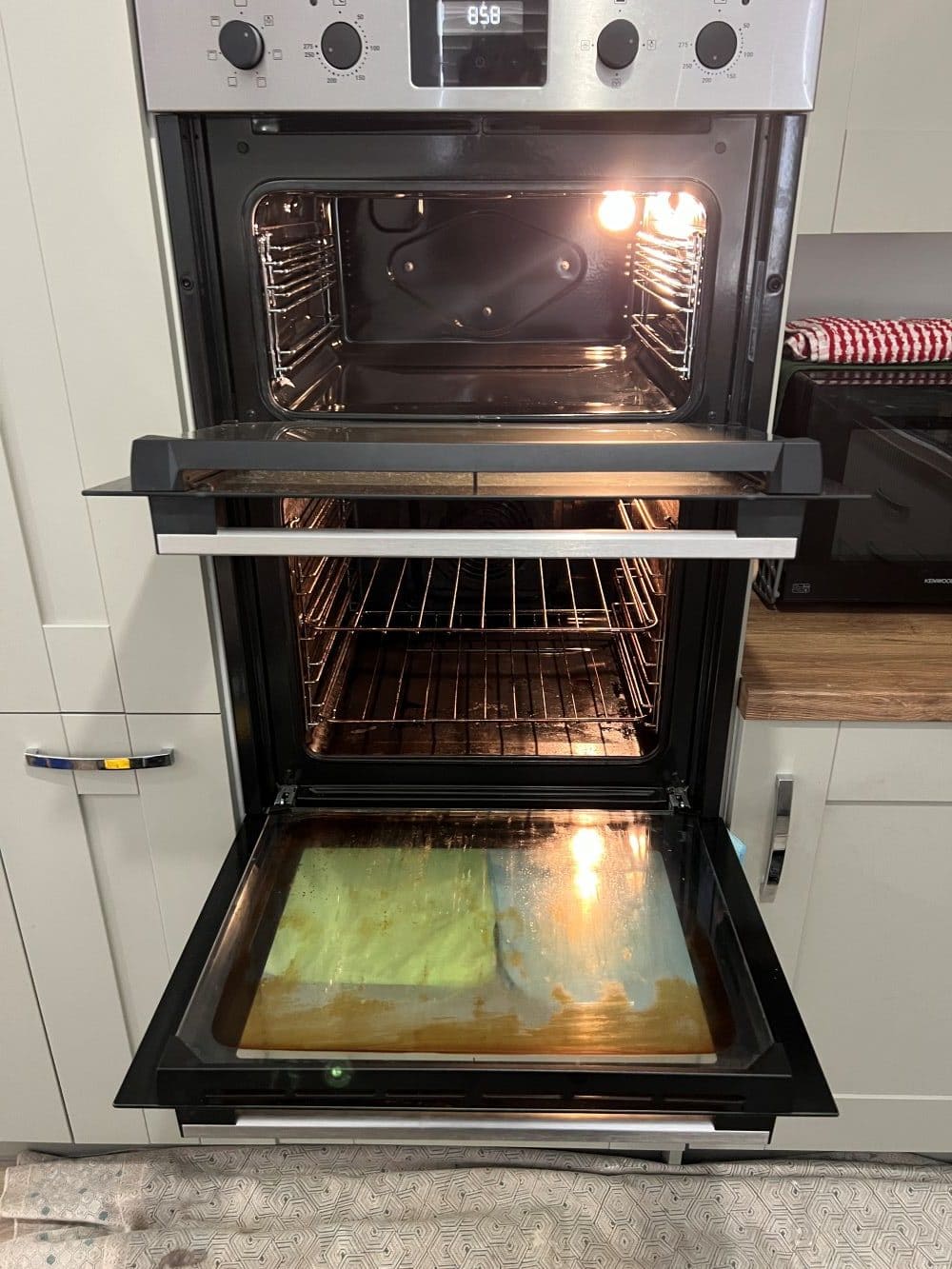 Oven Cleaning Wolverhampton 4 Double oven before cleaning in Wolverhampton with both doors open showing dirty interiors