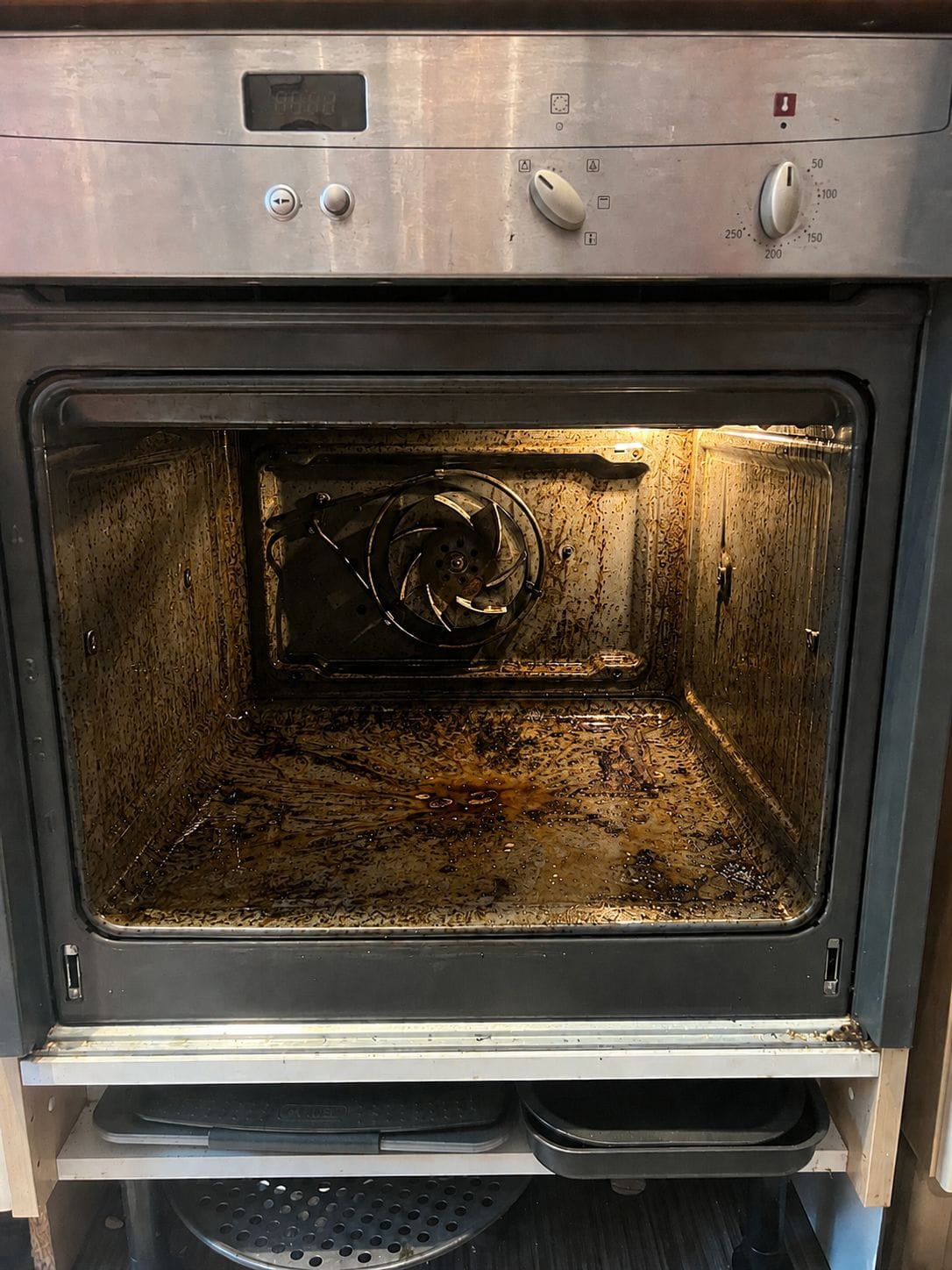 Oven cleaning in Alvechurch with the door, racks, side supports and backplate removed